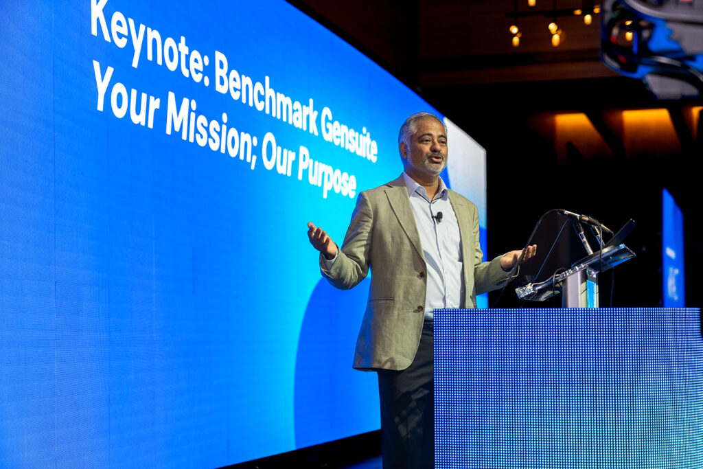 Benchmark Gensuite Founder & CEO delivers the keynote presentation at Impact 2025.